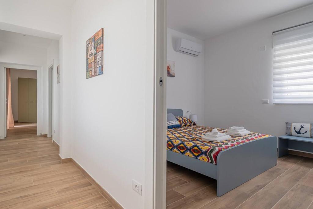 Postel nebo postele na pokoji v ubytování Maranto Terra - YourPlace Abruzzo