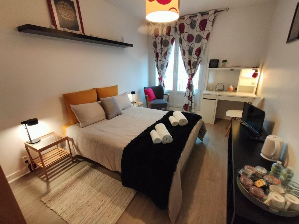 Postel nebo postele na pokoji v ubytování Appartement lumineux 70 m2 proche centre