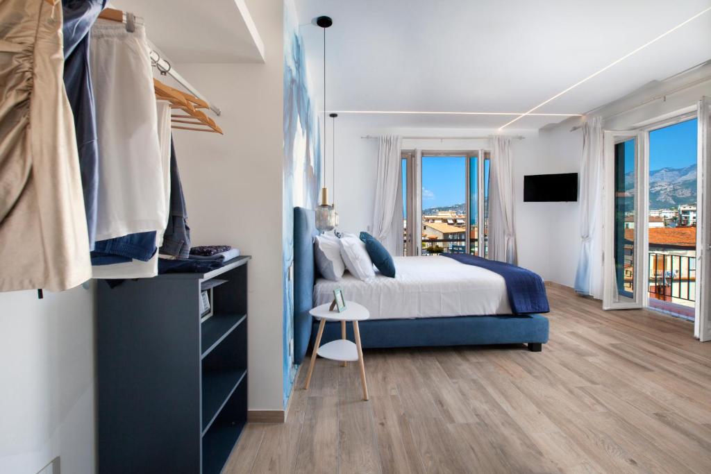 Postel nebo postele na pokoji v ubytování LuMar Luxury Sorrento