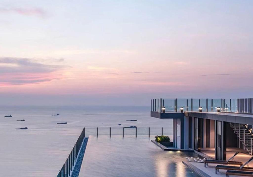 a view of the ocean from a building at The Base海景网红顶层无边泳池 双卧室套房 in Pattaya Central