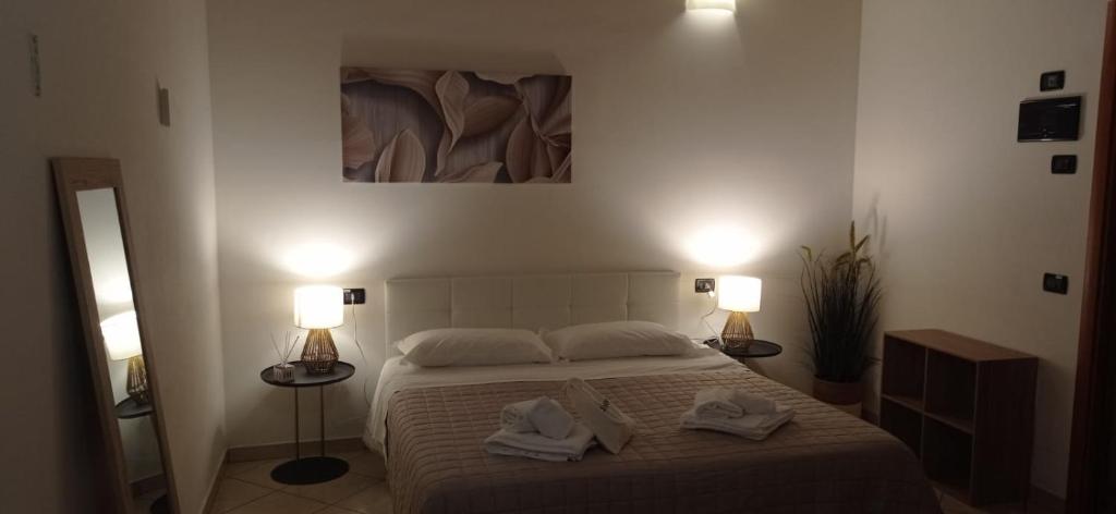Postel nebo postele na pokoji v ubytování Hotel IL Rifugio
