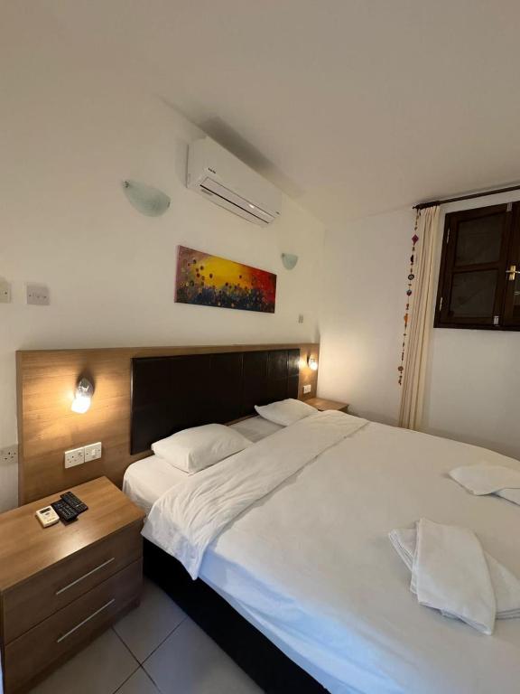 Postel nebo postele na pokoji v ubytování Betul Guest House