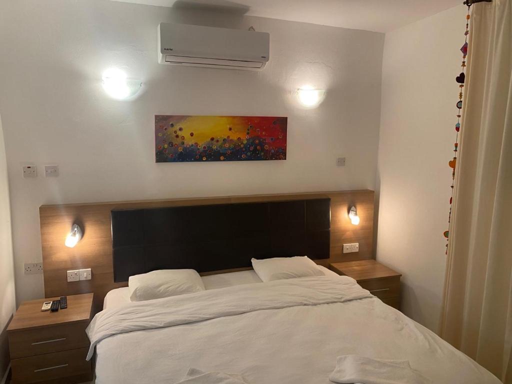 Postel nebo postele na pokoji v ubytování Betul Guest House