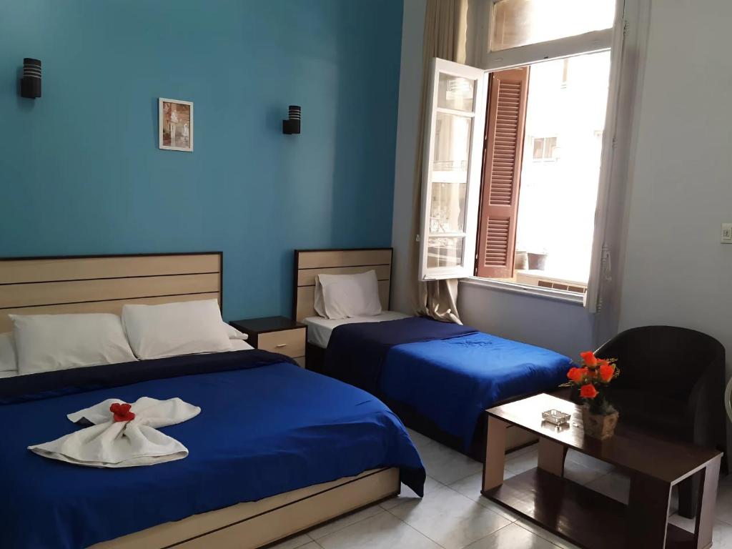 Postel nebo postele na pokoji v ubytování Hostgram Hotel