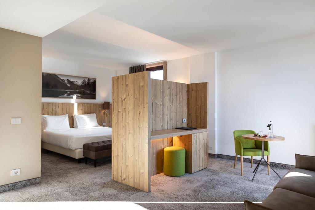 Postel nebo postele na pokoji v ubytování Linta Hotel Wellness & Spa