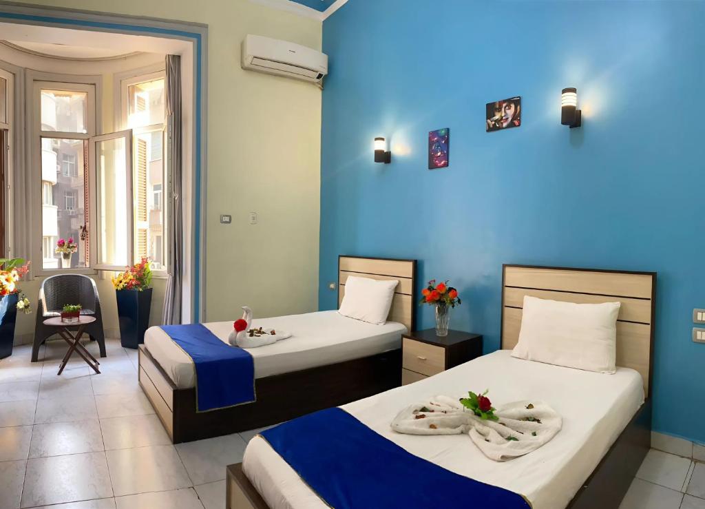 Postel nebo postele na pokoji v ubytování Hostgram Hotel