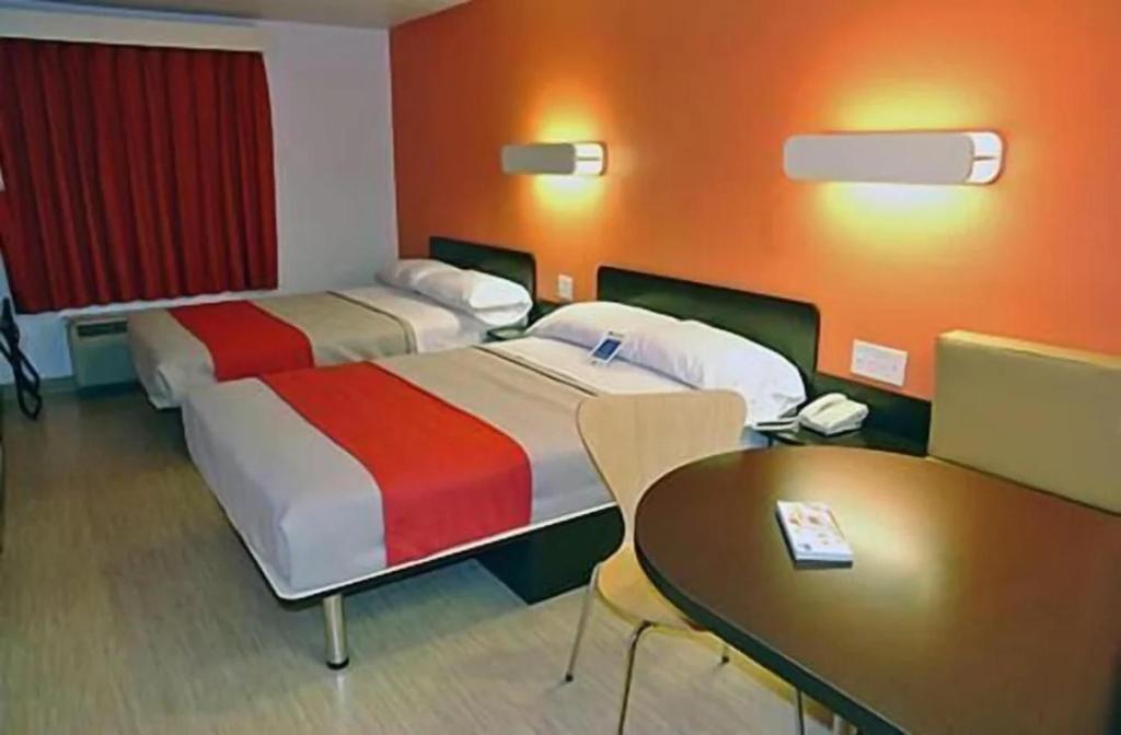 Postel nebo postele na pokoji v ubytování Motel 6-McKinney, TX - North