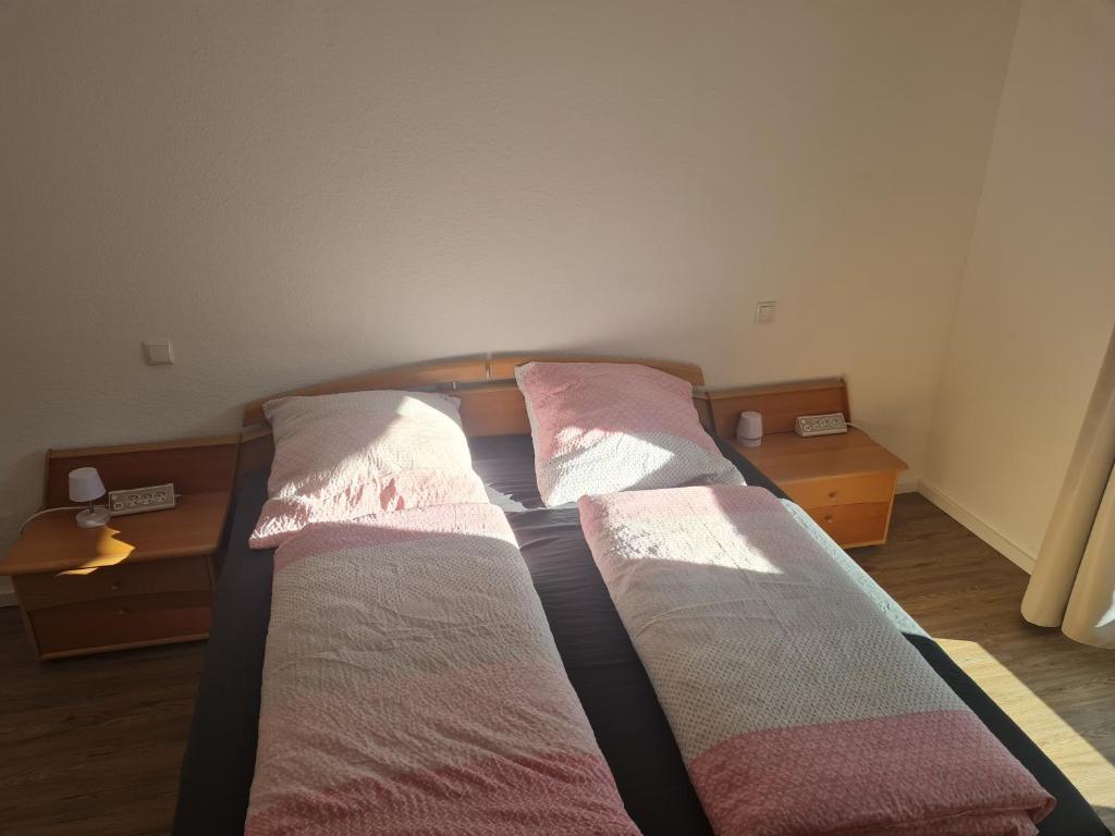 Postel nebo postele na pokoji v ubytování Ferienwohnung am Rursee