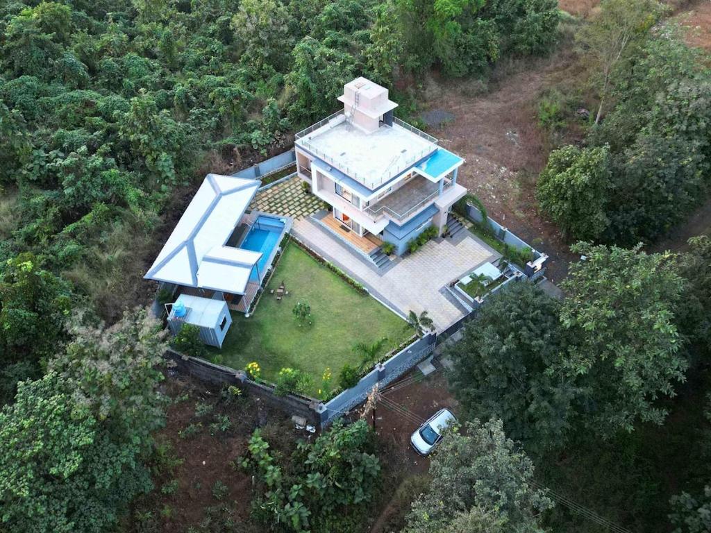 Zahrada ubytování Stay Leisurely Leviosa 3BHK, Karjat