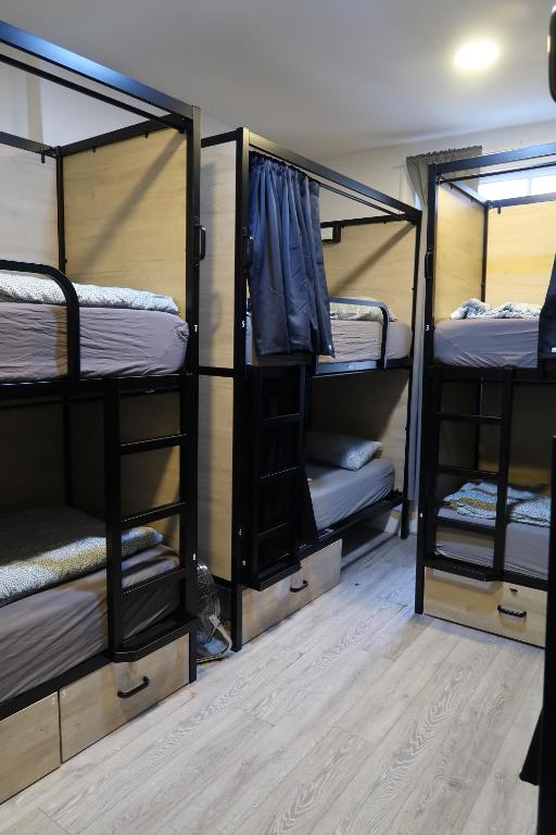 Postel nebo postele na pokoji v ubytování Onefam Notting Hill