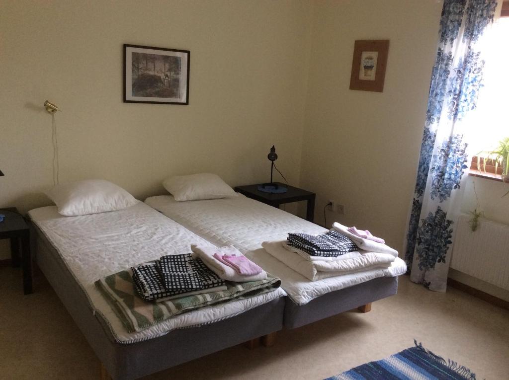 Postel nebo postele na pokoji v ubytování Ängens B&B