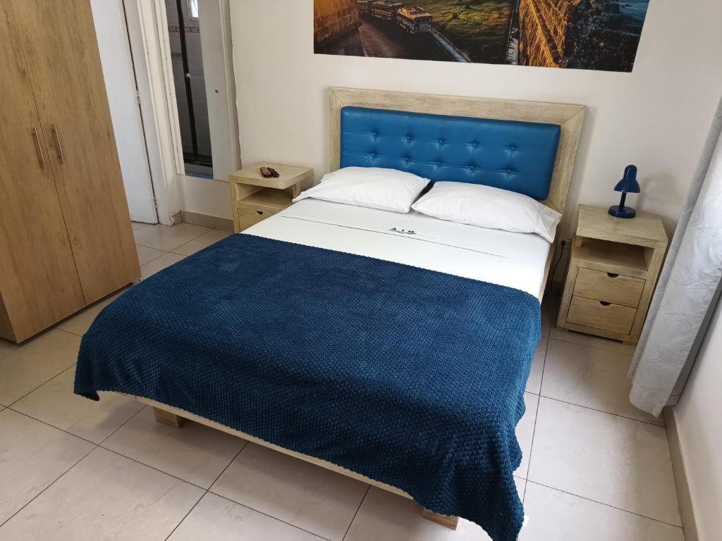 Postel nebo postele na pokoji v ubytování Air Guest House