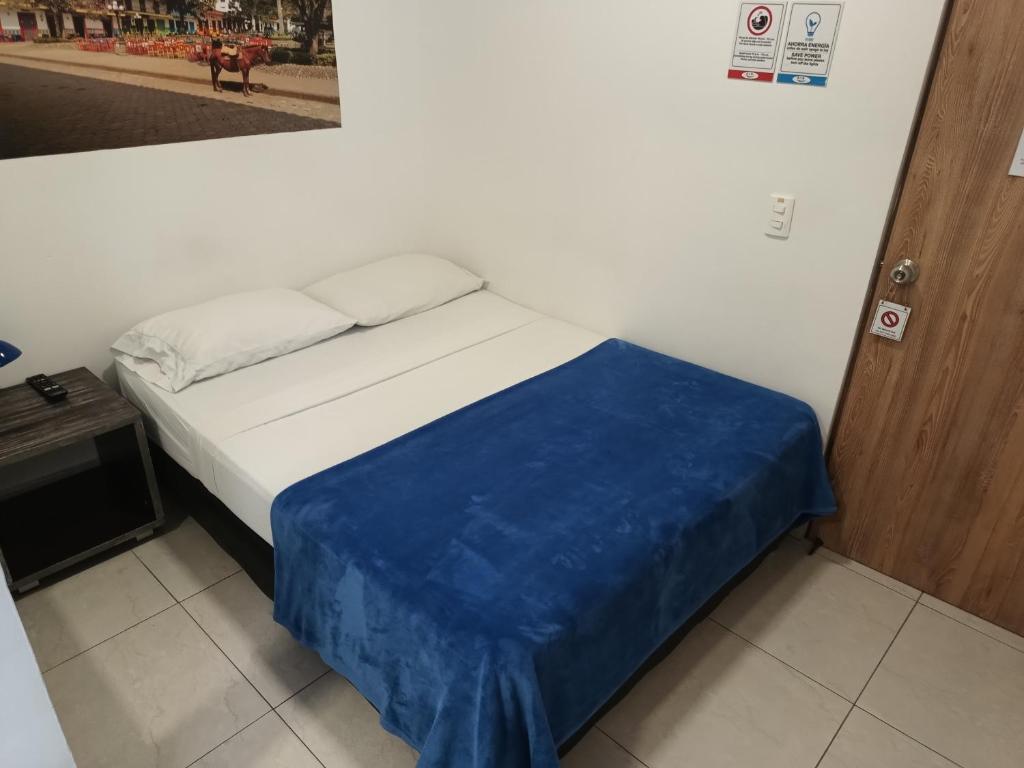 Postel nebo postele na pokoji v ubytování Air Guest House