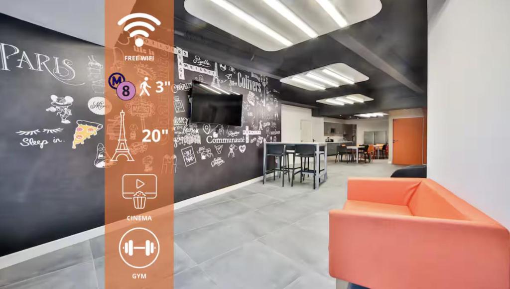 an office with a wall with drawings on it at 02.Studio#Charenton#Fitness#Cinema in Charenton-le-Pont