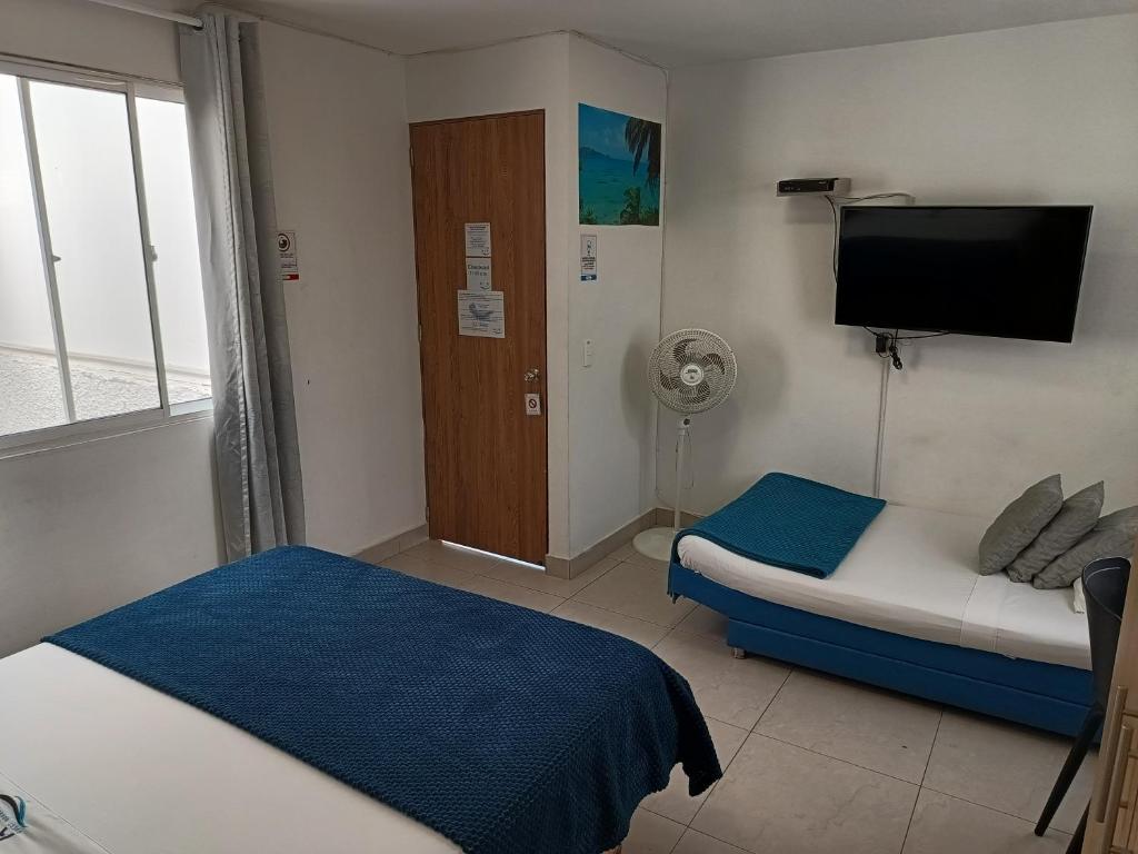 Postel nebo postele na pokoji v ubytování Air Guest House