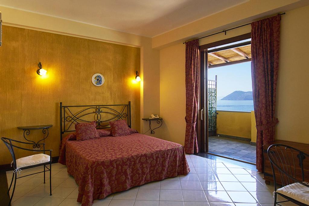 Postel nebo postele na pokoji v ubytování Hotel A Pinnata