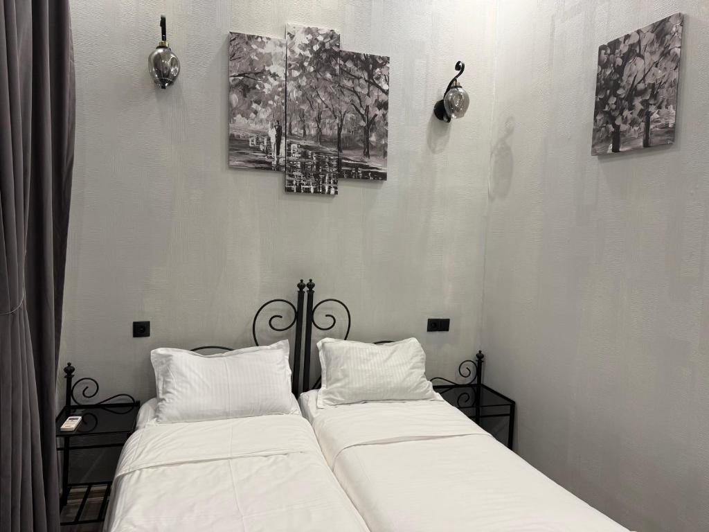 Postel nebo postele na pokoji v ubytování Hotel Four Inn