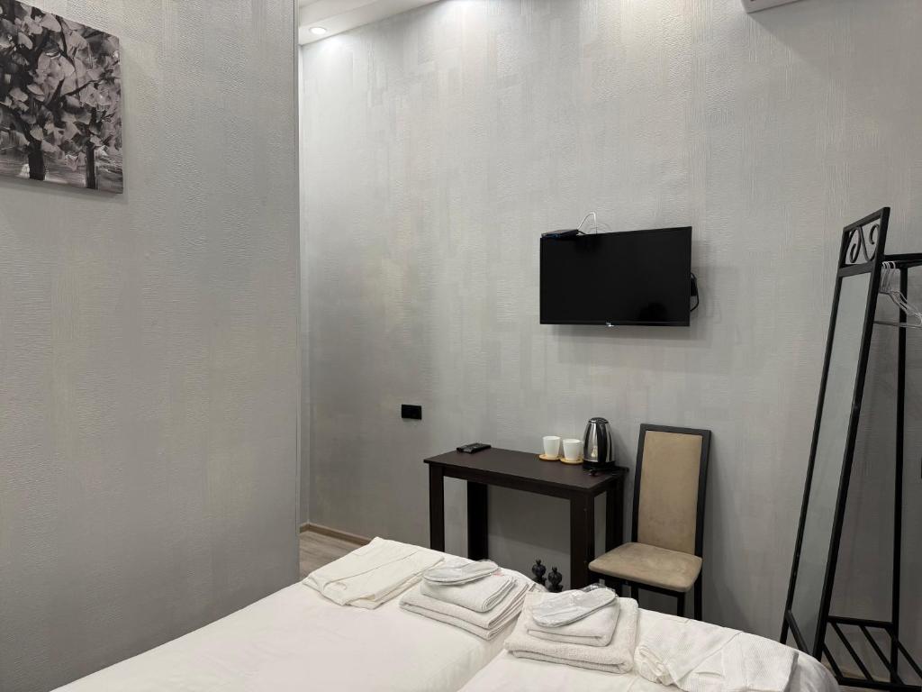 Postel nebo postele na pokoji v ubytování Hotel Four Inn