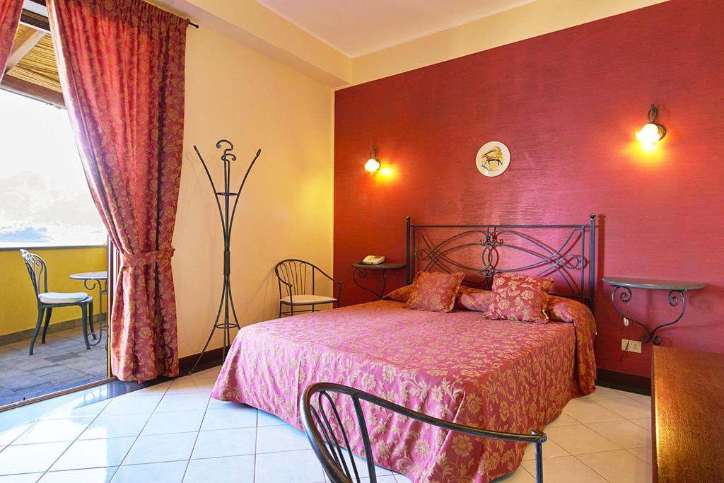 Postel nebo postele na pokoji v ubytování Hotel A Pinnata