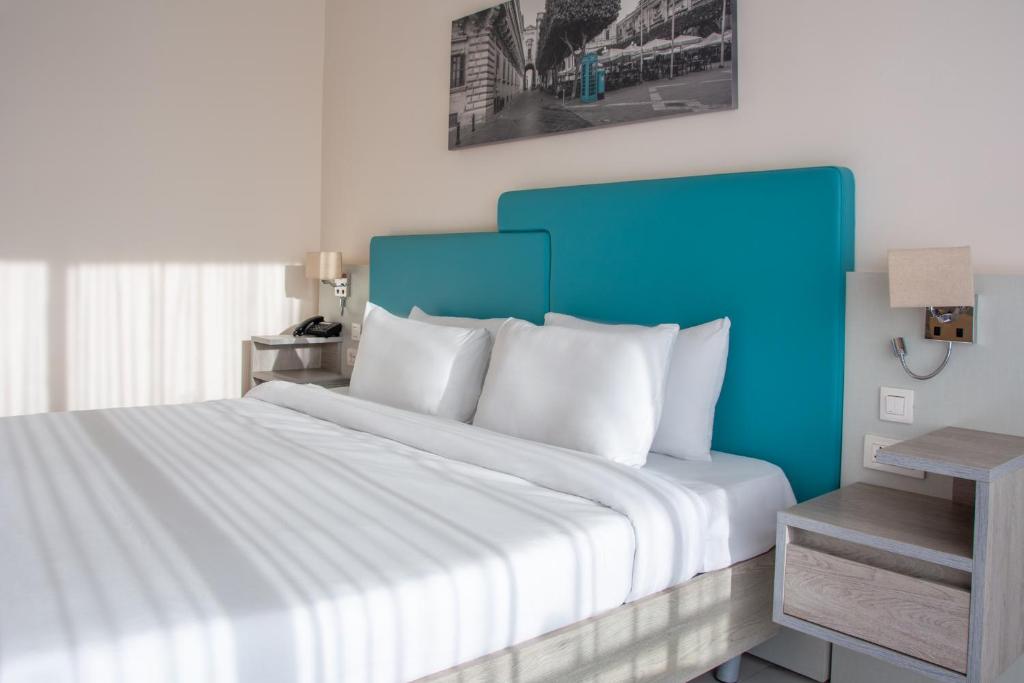 Postel nebo postele na pokoji v ubytování Riviera Spa Resort - Adults Only