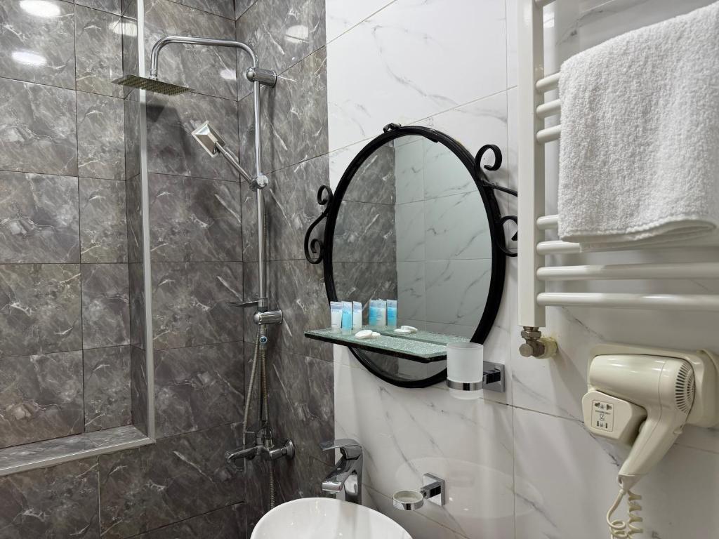 Koupelna v ubytování Hotel Four Inn