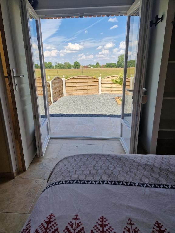 Postel nebo postele na pokoji v ubytování Gîte à la campagne au calme