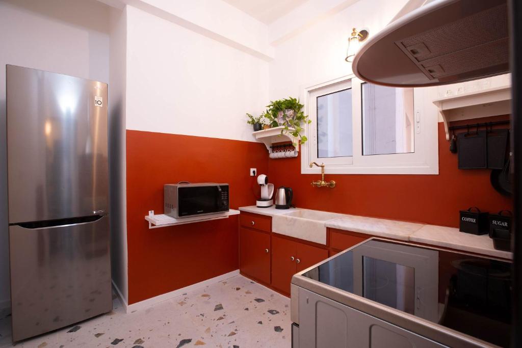 Kuchnia lub aneks kuchenny w obiekcie O&O Group Ruby's Urban Residence Koukaki