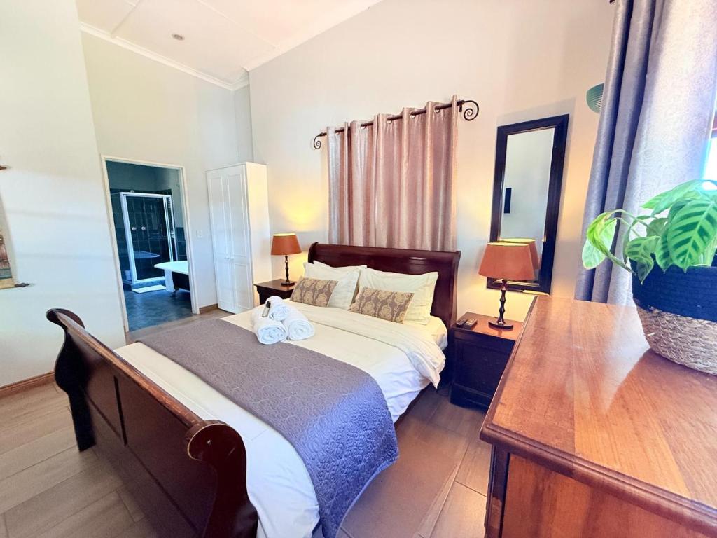 Katil atau katil-katil dalam bilik di Kniff un Gaffel Guest House