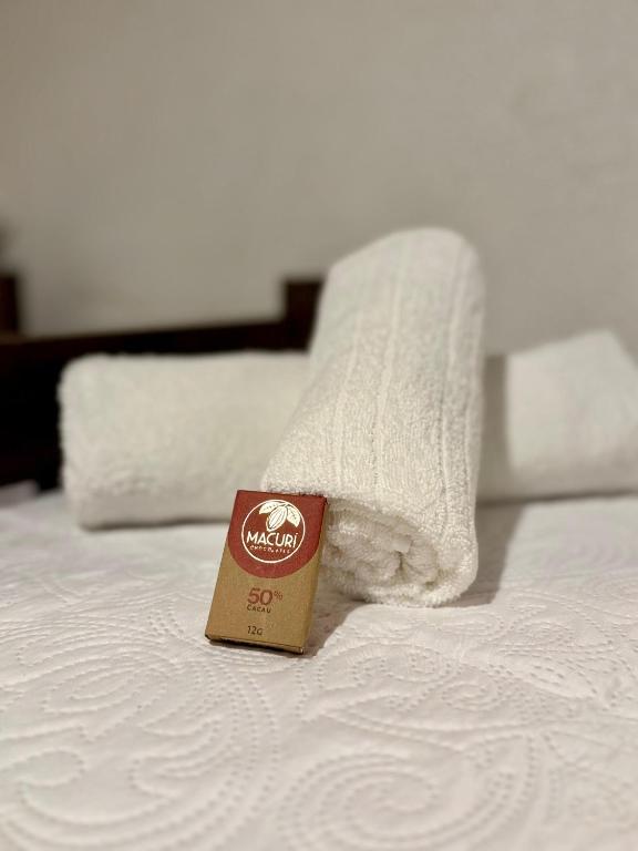 Postel nebo postele na pokoji v ubytování Caraíva Suítes