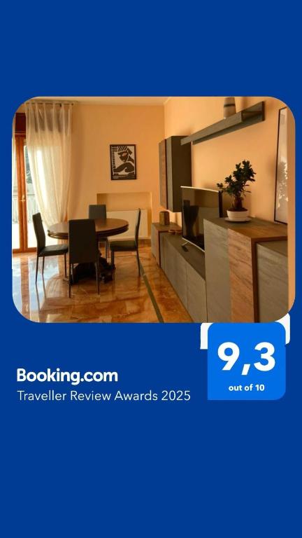 a living room with a table and a dining room at Mare qui in Gaeta