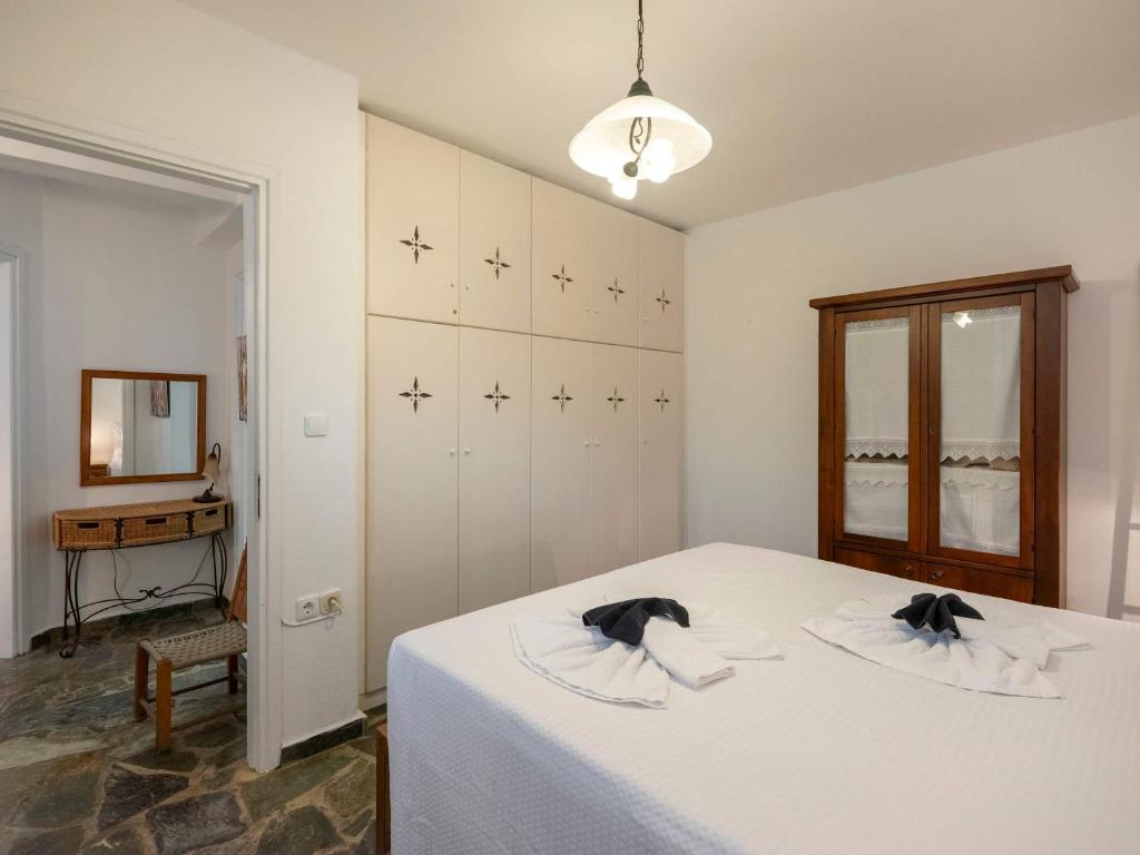 Postel nebo postele na pokoji v ubytování Paros' slice of Paradise
