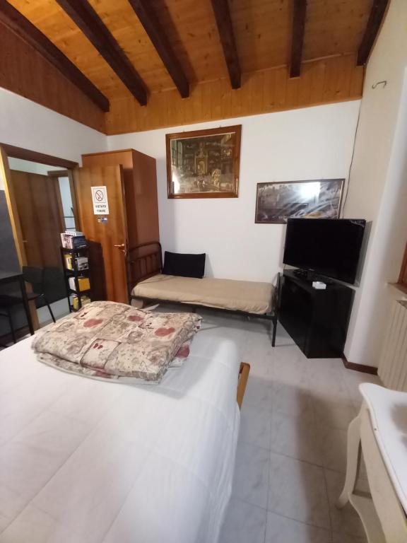 Postel nebo postele na pokoji v ubytování intero alloggio 2 camere matrimoniali