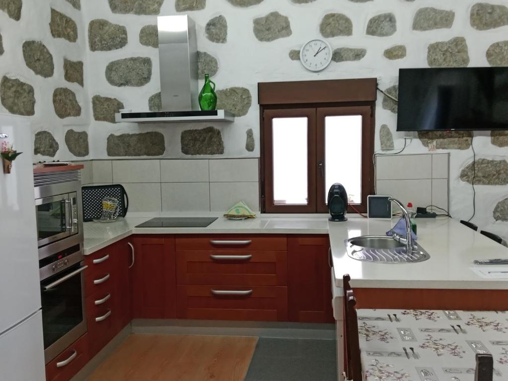Kuchyň nebo kuchyňský kout v ubytování Sol y campo Javier