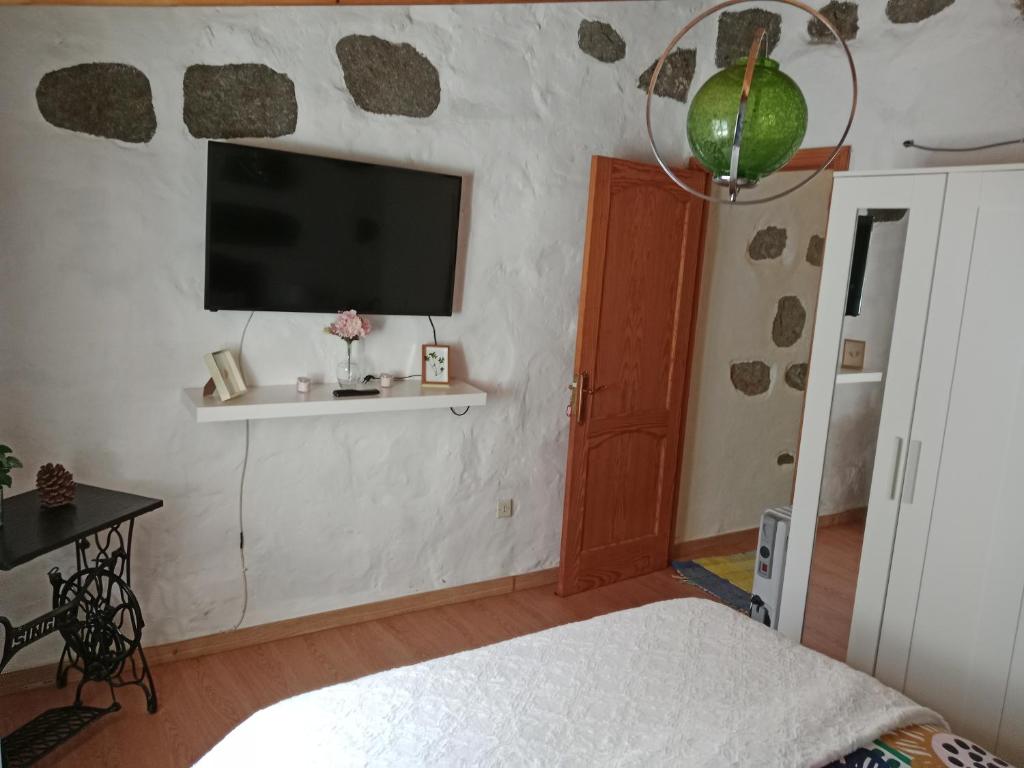 TV a/nebo společenská místnost v ubytování Sol y campo Javier