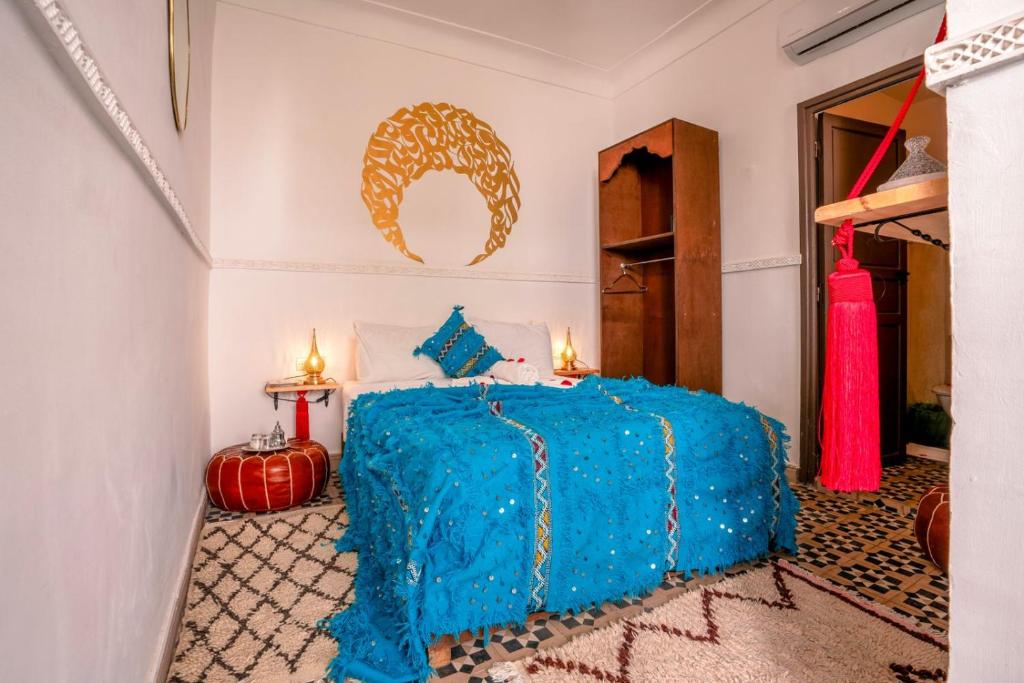 Postel nebo postele na pokoji v ubytování Riad Moulaty Lalla Khadija & SPA
