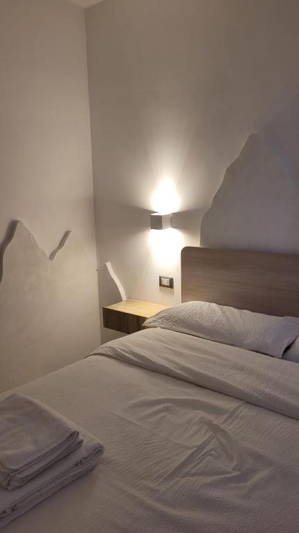Postel nebo postele na pokoji v ubytování Manuel Guesthouse Ravascletto