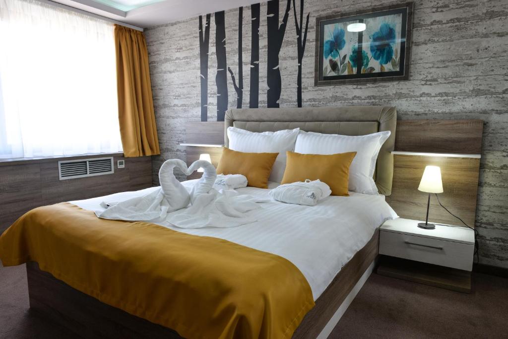 Postel nebo postele na pokoji v ubytování Hotel Ana Lux Spa