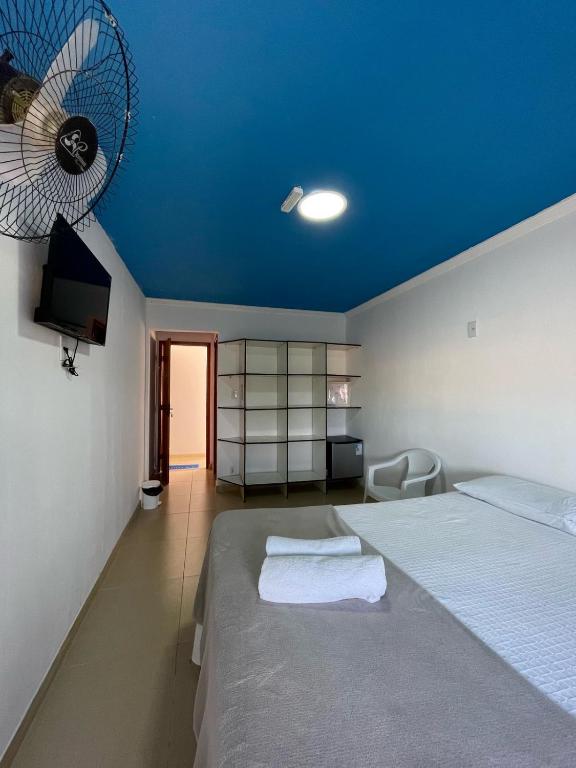 Cama ou camas em um quarto em Pousada Bellmar - Praia Peró 5 min andando