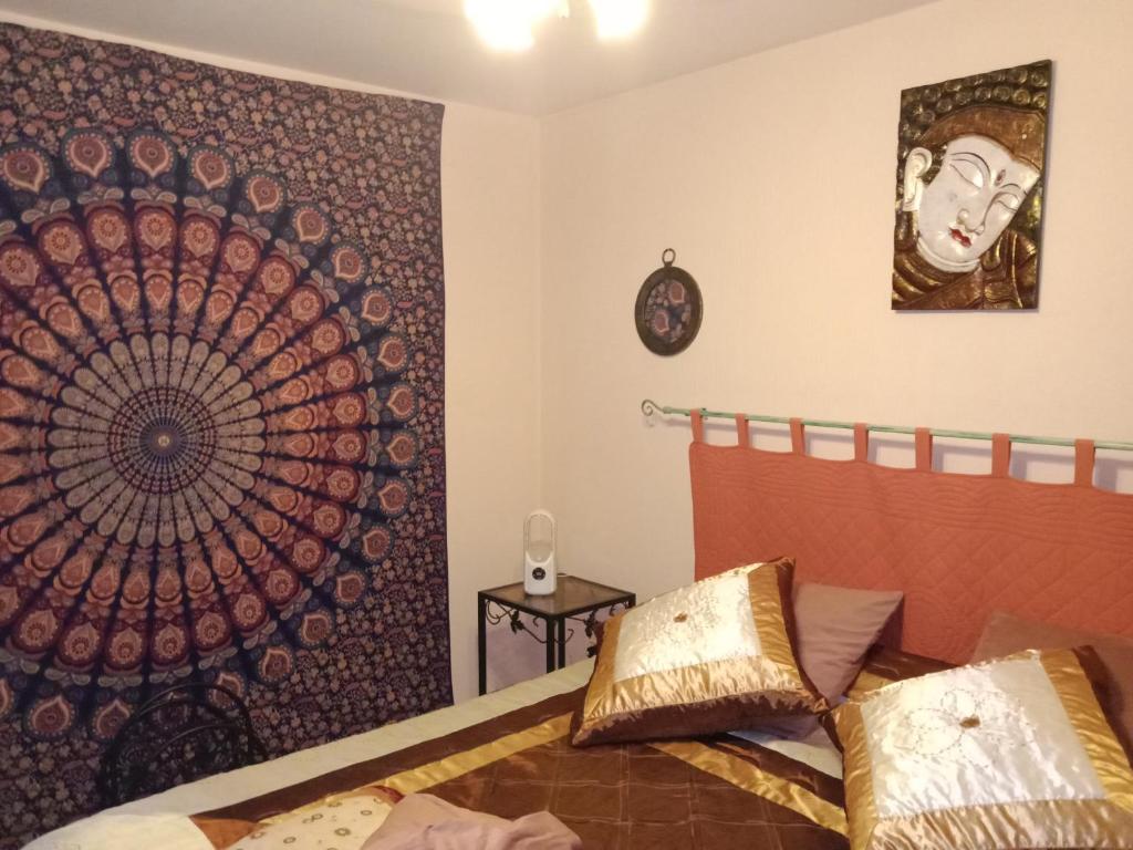 Postel nebo postele na pokoji v ubytování chambres studio 25 M2 et table d'hôtes Ruoms