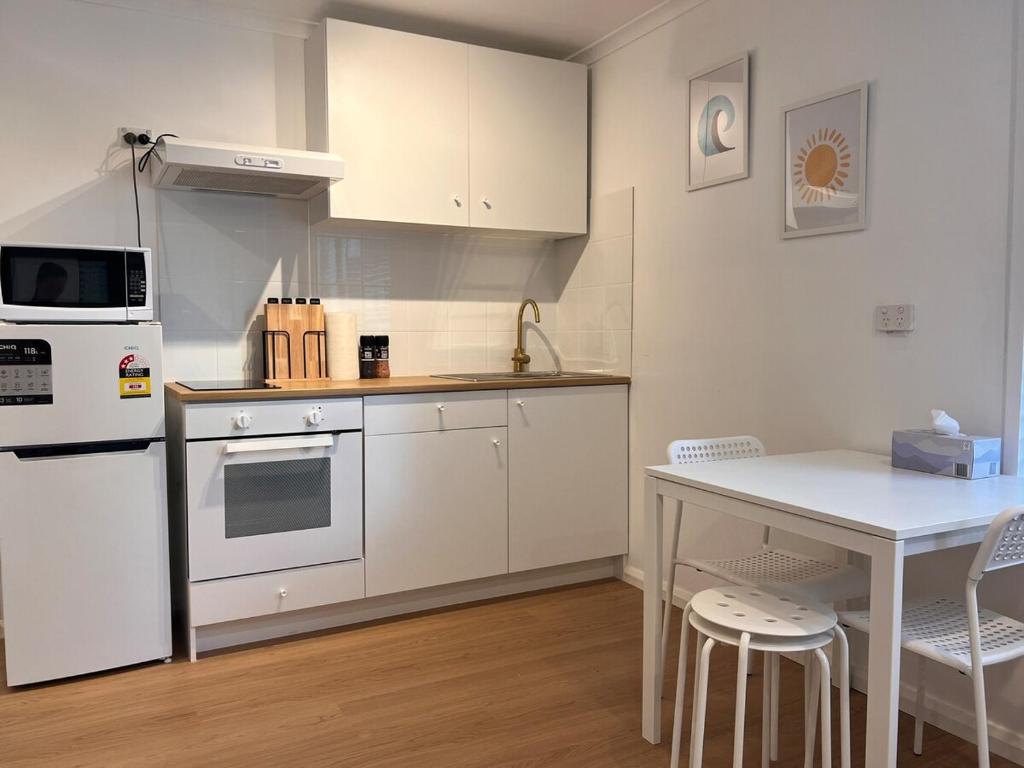 Kuchyň nebo kuchyňský kout v ubytování Park View Guest suite A