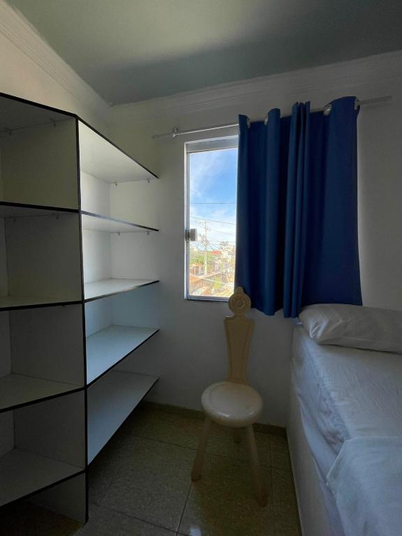 Cama ou camas em um quarto em Pousada Bellmar - Praia Peró 5 min andando