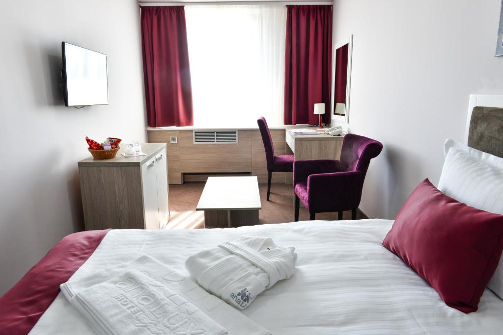 Postel nebo postele na pokoji v ubytování Hotel Ana Lux Spa