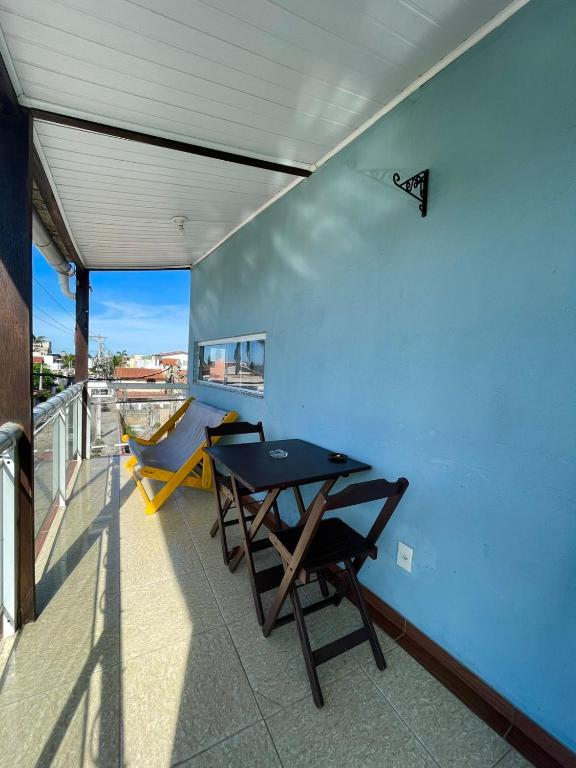 Uma varanda ou terraço em Pousada Bellmar - Praia Peró 5 min andando