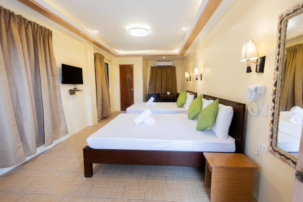 Μια τηλεόραση ή/και κέντρο ψυχαγωγίας στο Anahaw Seaside Inn