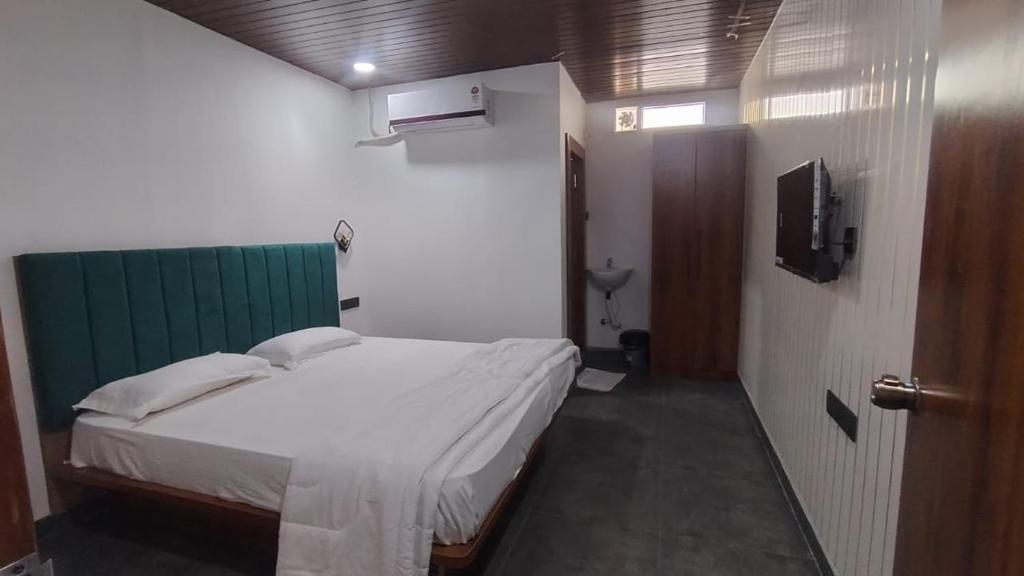 Postel nebo postele na pokoji v ubytování Hotel M Hyatt