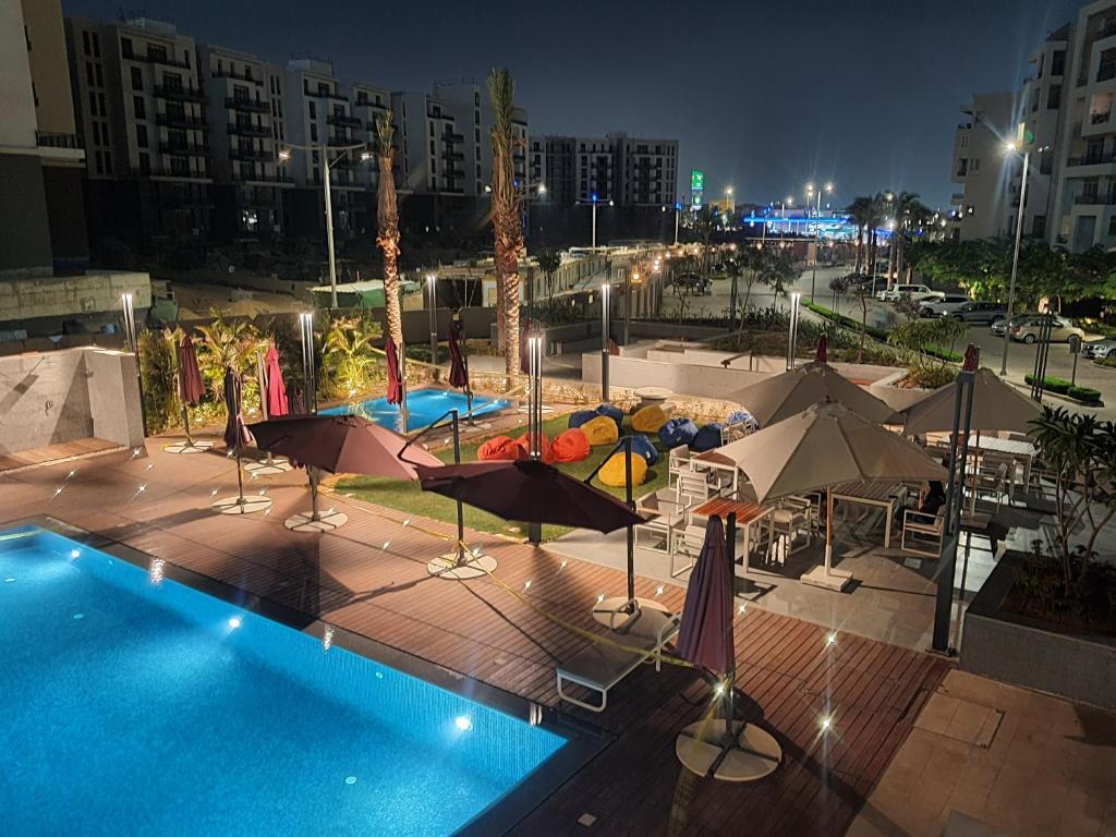 Bazén v ubytování Axxodia- Apartments In Cairo Festival City nebo v jeho okolí