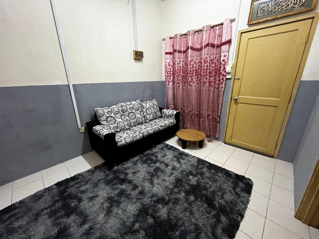 Istumisnurk majutusasutuses Homestay Seri Aishah