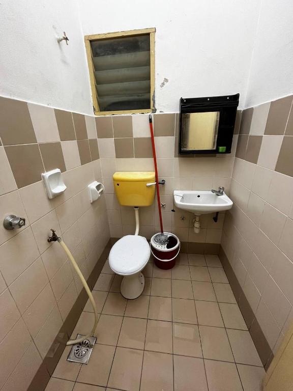 Vannituba majutusasutuses Homestay Seri Aishah