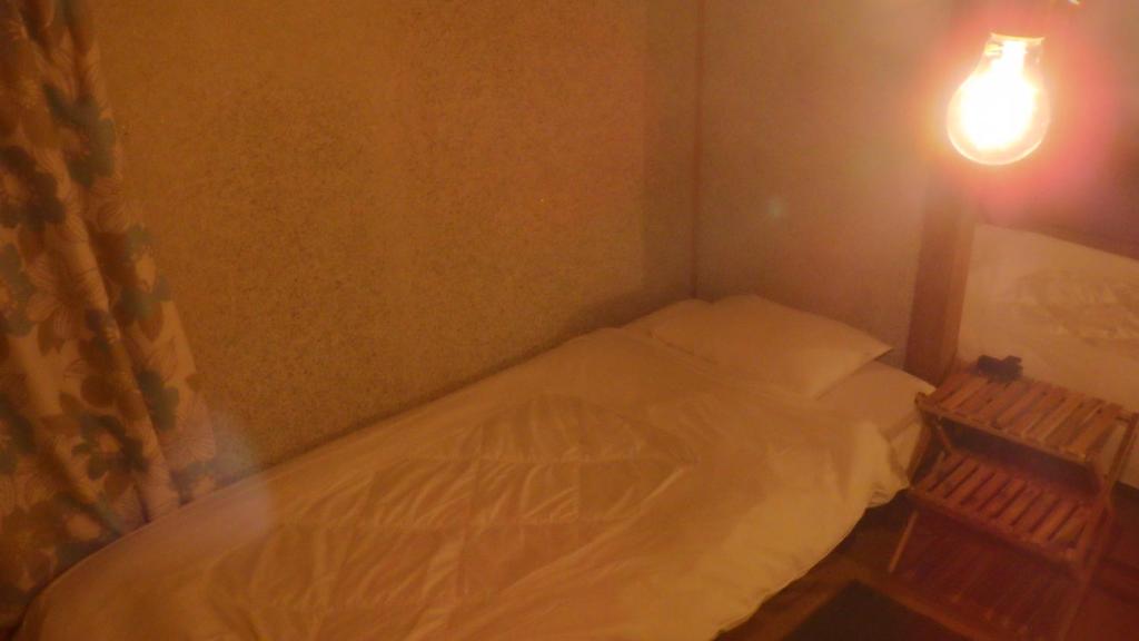 Cosmos Guesthouse Iya Valleyにあるベッド