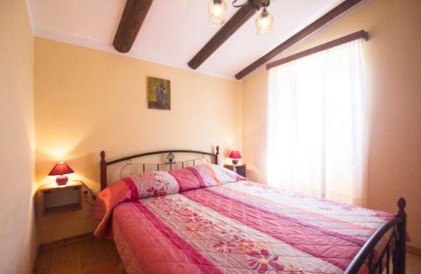 Postel nebo postele na pokoji v ubytování Holiday Home Maria